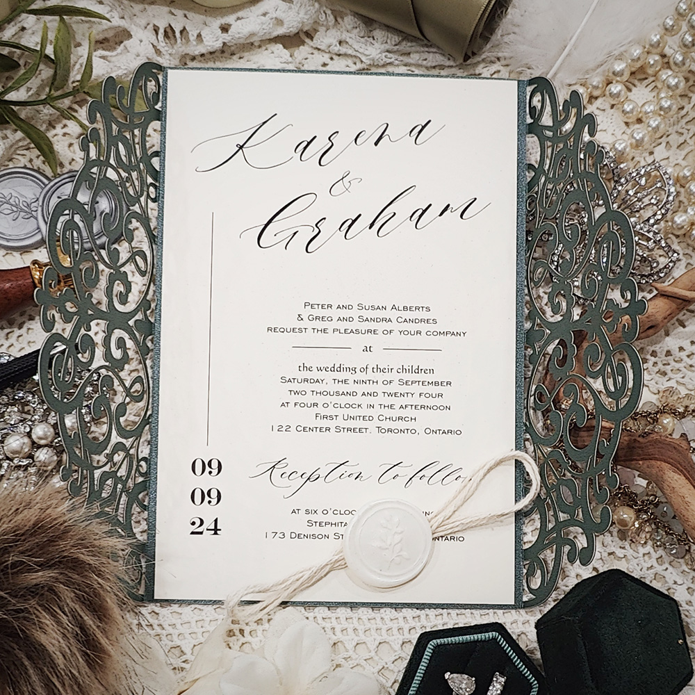 Invitation 5409: Emerald Green Velvet, Ivory Wax, String Ribbon - Emerald Green velvet laser cut design with a string and ivory wax seal.